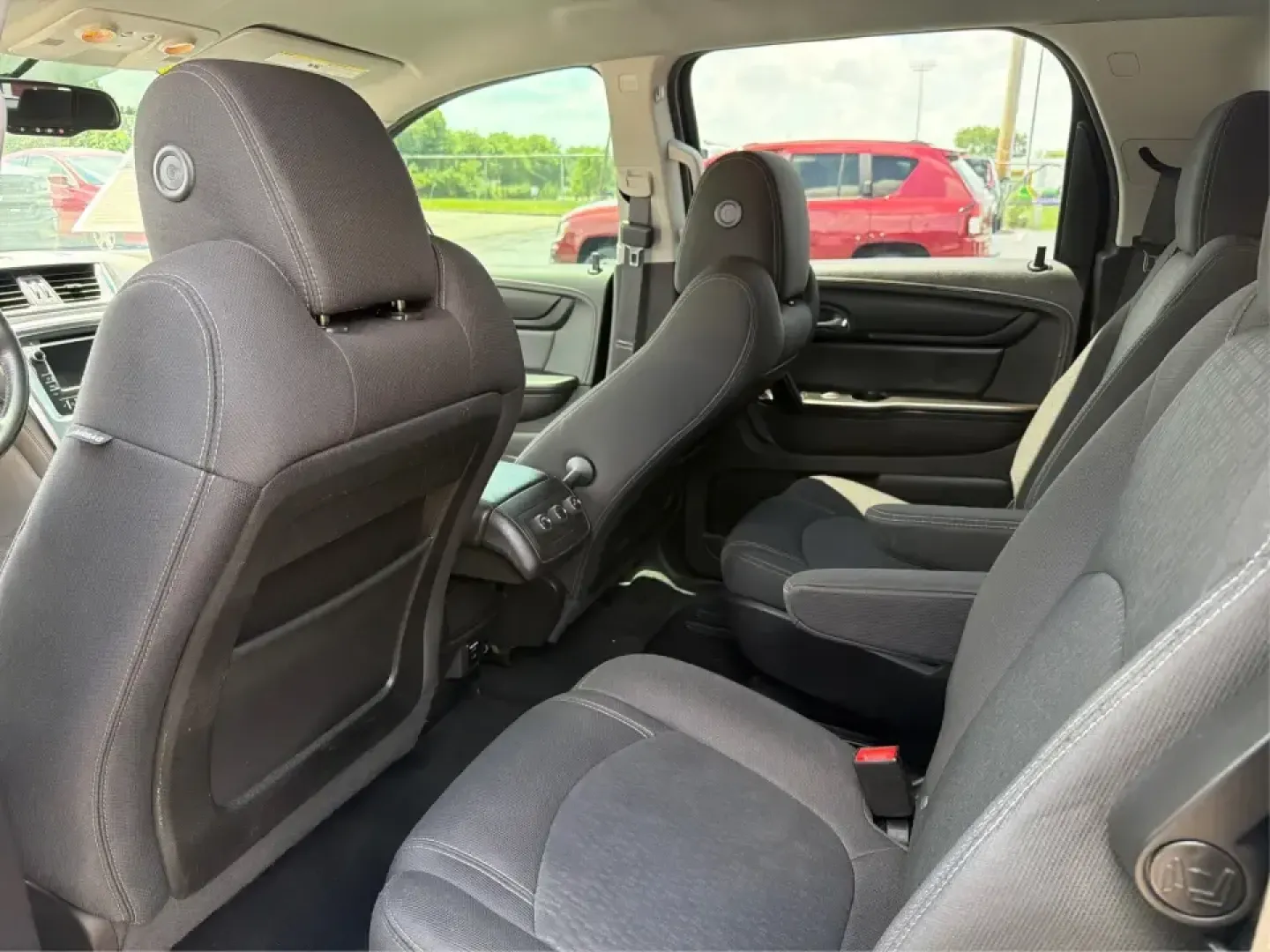 2016 GMC Acadia SLE-2 (1GKKVPKD1GJ) with an 3.6L V-6 gasoline direct injection engine, 6A transmission, located at 401 Woodman Dr, Riverside, OH, 45431, (937) 908-9800, 39.760899, -84.123421 - Need one SUV that can handle school drop-offs, long commutes, and weekend getaways to the MetroParks without feeling cramped? This 2016 GMC Acadia SLE-2 in Ebony Twilight Metallic is a smart fit for busy families and active drivers who want three-row flexibility, confident traction, and everyday com- Photo#10