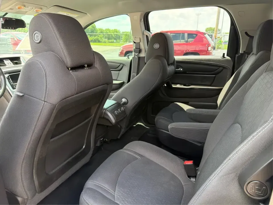 2016 GMC Acadia SLE-2 (1GKKVPKD1GJ) with an 3.6L V-6 gasoline direct injection engine, 6A transmission, located at 401 Woodman Dr, Riverside, OH, 45431, (937) 908-9800, 39.760899, -84.123421 - Need one SUV that can handle school drop-offs, long commutes, and weekend getaways to the MetroParks without feeling cramped? This 2016 GMC Acadia SLE-2 in Ebony Twilight Metallic is a smart fit for busy families and active drivers who want three-row flexibility, confident traction, and everyday com - Photo#10