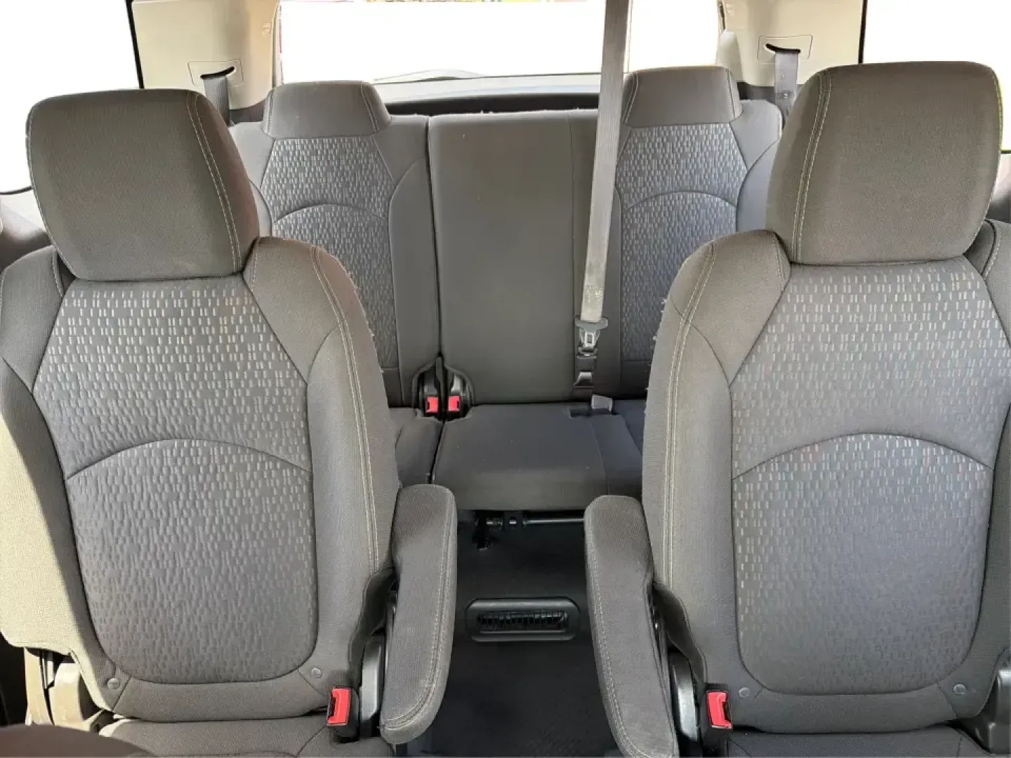 2016 GMC Acadia SLE-2 (1GKKVPKD1GJ) with an 3.6L V-6 gasoline direct injection engine, 6A transmission, located at 401 Woodman Dr, Riverside, OH, 45431, (937) 908-9800, 39.760899, -84.123421 - Need one SUV that can handle school drop-offs, long commutes, and weekend getaways to the MetroParks without feeling cramped? This 2016 GMC Acadia SLE-2 in Ebony Twilight Metallic is a smart fit for busy families and active drivers who want three-row flexibility, confident traction, and everyday com- Photo#13