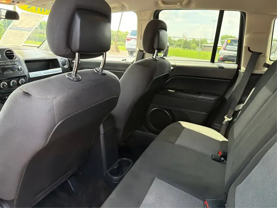 2015 Jeep Compass Sport (1C4NJDBB8FD) with an 2.4L I-4 DOHC engine, located at 401 Woodman Dr, Riverside, OH, 45431, (937) 908-9800, 39.760899, -84.123421 - Weekend plans don't always stay on pavement-and that's exactly where this 2015 Jeep Compass Sport shines. Whether you're mapping out a family day at Riverscape MetroPark, heading to Wright-Patterson AFB for work, or taking a quick escape to the trails and backroads outside Riverside, this compact SU - Photo#10