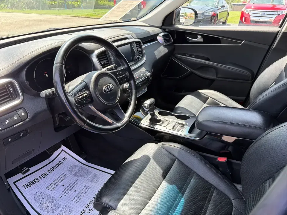 2016 Kia Sorento SX V6 AWD (5XYPKDA57GG) with an 3.3L V6 DOHC 24V engine, 6-Speed Automatic transmission, located at 1951 S Dayton Lakeview Rd., New Carlisle, OH, 45344, (937) 908-9800, 39.890999, -84.050255 - Pack up the kids, load the cooler, and point the nose toward a weekend at Buck Creek State Park or a day trip through the Miami Valley-this 2016 Kia Sorento SX V6 is the kind of SUV that fits real life in New Carlisle. With three-row flexibility, confident all-weather capability, and comfort feature - Photo#9