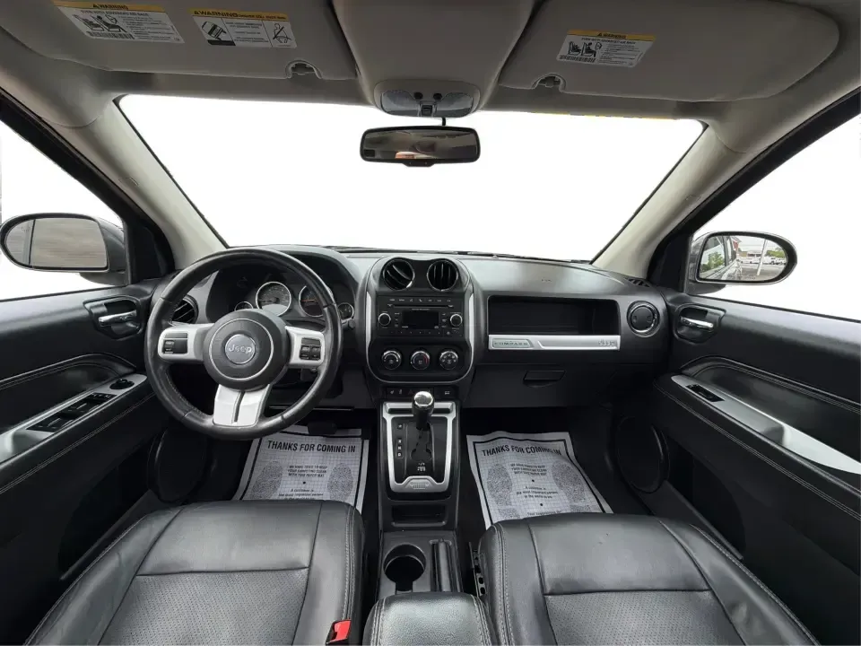 2016 Jeep Compass High Altitude Edition (1C4NJDEB2GD) with an 2.4L I-4 DOHC engine, 6A transmission, located at 8750 N County Rd 25A, Piqua, OH, 45356, (937) 908-9800, 40.164391, -84.232513 - Need a compact SUV that can handle Ohio weather, weekday commutes, and spontaneous weekend escapes without feeling bulky? This **2016 Jeep Compass High Altitude Edition 4WD** fits that lifestyle well-easy to park for errands around town, confident on wet back roads, and comfortable for longer drives - Photo#21