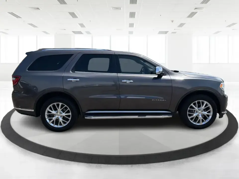 2014 Dodge Durango Citadel (1C4RDJEG5EC) with an 3.6L V6 DOHC 24V engine, 8-Speed Automatic transmission, located at 1099 N County Rd 25A , Troy, OH, 45373, (937) 908-9800, 40.057079, -84.212883 - Load up the family, point the nose toward I75, and turn everyday errands into comfortable road trips-this 2014 Dodge Durango Citadel is built for drivers who want three-row versatility, confident traction, and premium features without stepping into a brand-new payment. Whether you're commuting acros - Photo#1