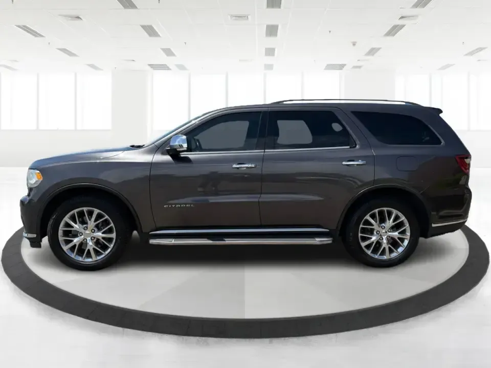 2014 Dodge Durango Citadel (1C4RDJEG5EC) with an 3.6L V6 DOHC 24V engine, 8-Speed Automatic transmission, located at 1099 N County Rd 25A , Troy, OH, 45373, (937) 908-9800, 40.057079, -84.212883 - Load up the family, point the nose toward I75, and turn everyday errands into comfortable road trips-this 2014 Dodge Durango Citadel is built for drivers who want three-row versatility, confident traction, and premium features without stepping into a brand-new payment. Whether you're commuting acros - Photo#5