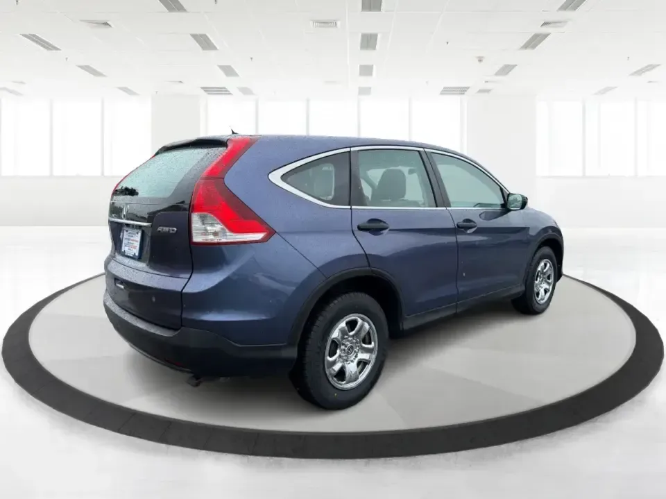 2014 Honda CR-V LX (2HKRM4H30EH) with an 2.4L I-4 DOHC engine, 5-Speed Automatic transmission, located at 401 Woodman Dr, Riverside, OH, 45431, (937) 908-9800, 39.760899, -84.123421 - Picture your next weekend: a quick run down Woodman Dr for errands, a family day at Riverscape MetroPark, or an easy I675 commute with room for groceries, strollers, and sports gear. This 2014 Honda CRV LX in Twilight Blue Metallic is the kind of practical SUV that fits real life in Riverside, Ohio- - Photo#2