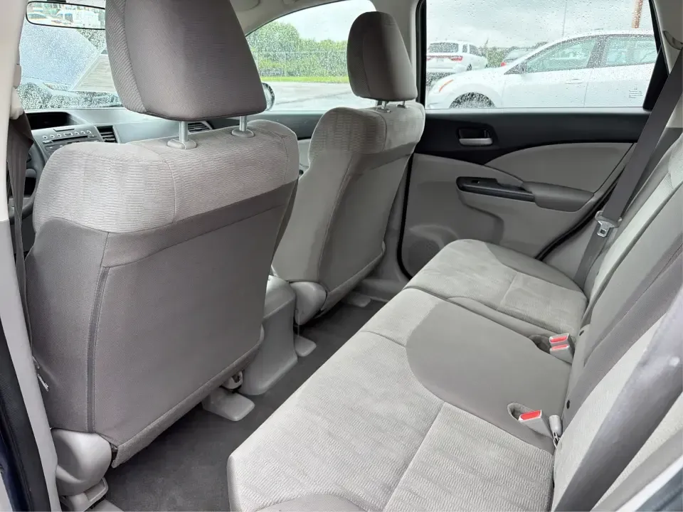 2014 Honda CR-V LX (2HKRM4H30EH) with an 2.4L I-4 DOHC engine, 5-Speed Automatic transmission, located at 401 Woodman Dr, Riverside, OH, 45431, (937) 908-9800, 39.760899, -84.123421 - Picture your next weekend: a quick run down Woodman Dr for errands, a family day at Riverscape MetroPark, or an easy I675 commute with room for groceries, strollers, and sports gear. This 2014 Honda CRV LX in Twilight Blue Metallic is the kind of practical SUV that fits real life in Riverside, Ohio- - Photo#10
