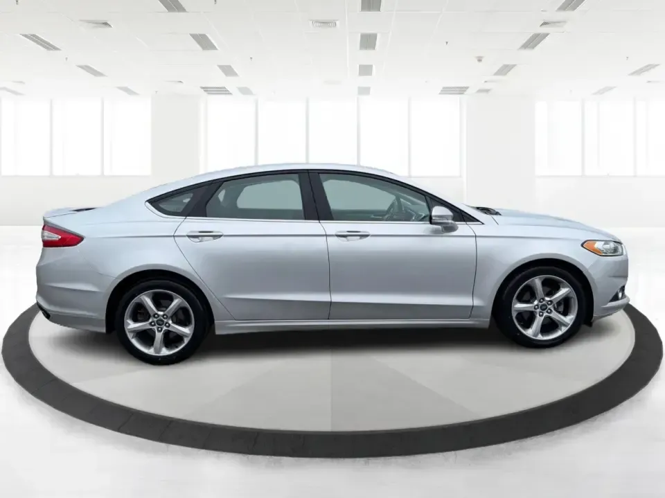 2014 Ford Fusion SE (3FA6P0H90ER) with an 2.0L L4 DOHC 16V engine, located at 1951 S Dayton Lakeview Rd., New Carlisle, OH, 45344, (937) 908-9800, 39.890999, -84.050255 - Need a smart, comfortable sedan for the daily drive from New Carlisle to Dayton, Wright-Patterson AFB, or Springfield-plus something that's still enjoyable for weekend trips to Buck Creek or an evening out near The Greene? This 2014 Ford Fusion SE blends commuter-friendly efficiency with upscale fea - Photo#1