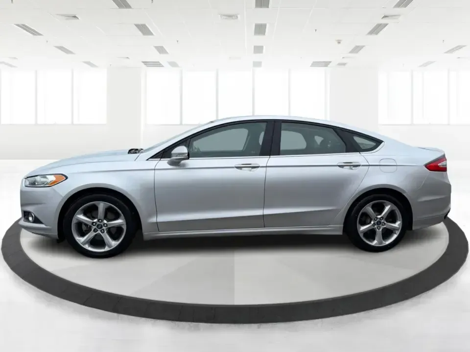 2014 Ford Fusion SE (3FA6P0H90ER) with an 2.0L L4 DOHC 16V engine, located at 1951 S Dayton Lakeview Rd., New Carlisle, OH, 45344, (937) 908-9800, 39.890999, -84.050255 - Need a smart, comfortable sedan for the daily drive from New Carlisle to Dayton, Wright-Patterson AFB, or Springfield-plus something that's still enjoyable for weekend trips to Buck Creek or an evening out near The Greene? This 2014 Ford Fusion SE blends commuter-friendly efficiency with upscale fea - Photo#5