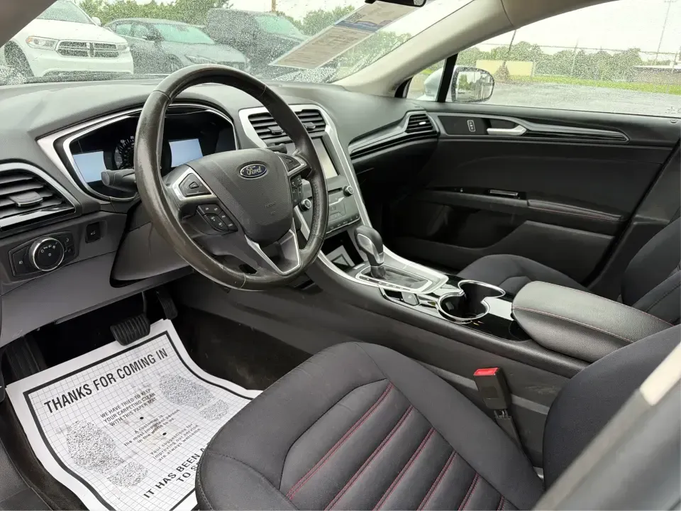 2014 Ford Fusion SE (3FA6P0H90ER) with an 2.0L L4 DOHC 16V engine, located at 1951 S Dayton Lakeview Rd., New Carlisle, OH, 45344, (937) 908-9800, 39.890999, -84.050255 - Need a smart, comfortable sedan for the daily drive from New Carlisle to Dayton, Wright-Patterson AFB, or Springfield-plus something that's still enjoyable for weekend trips to Buck Creek or an evening out near The Greene? This 2014 Ford Fusion SE blends commuter-friendly efficiency with upscale fea - Photo#9