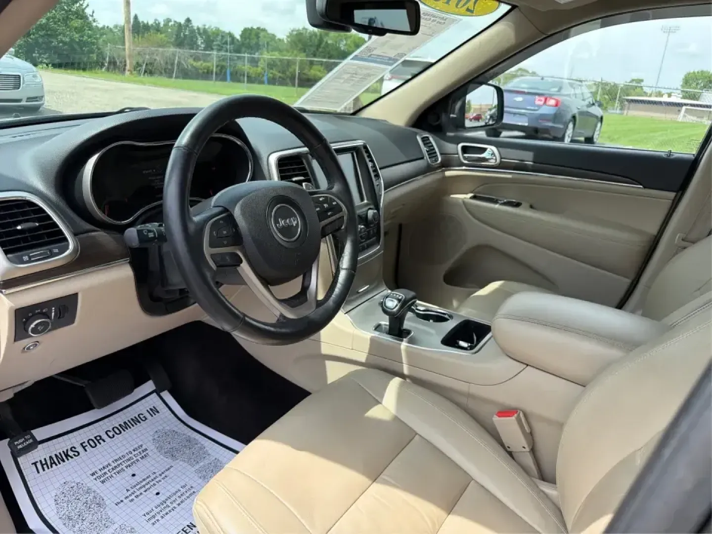 2015 Jeep Grand Cherokee Limited (1C4RJEBG4FC) with an 3.6L V6 DOHC 24V engine, 8-Speed Automatic transmission, located at 1184 Kauffman Ave, Fairborn, OH, 45324, (937) 908-9800, 39.807072, -84.030914 - Picture your next weekend: loading up the family for a day at Carillon Historical Park, cruising down I675 with the A/C keeping everyone comfortable, then heading out toward Eastwood MetroPark with plenty of cargo space for chairs, coolers, and gear. This 2015 Jeep Grand Cherokee Limited is the kind - Photo#9