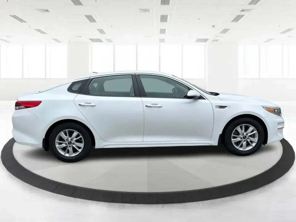 2016 Kia Optima LX (KNAGT4L36G5) with an Theta II 2.4L I-4 gasoline direct injection engine, 6A transmission, located at 401 Woodman Dr, Riverside, OH, 45431, (937) 908-9800, 39.760899, -84.123421 - Need a dependable sedan that can handle the weekday commute down I-675, quick school drop-offs near Mad River, and an easy weekend drive to Carillon Historical Park or a Dayton Dragons game? This 2016 Kia Optima LX in Snow White Pearl delivers the kind of practical comfort and modern tech that fits - Photo#1