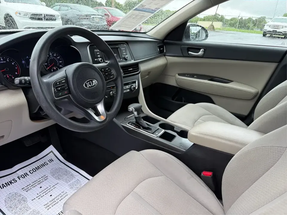 2016 Kia Optima LX (KNAGT4L36G5) with an Theta II 2.4L I-4 gasoline direct injection engine, 6A transmission, located at 401 Woodman Dr, Riverside, OH, 45431, (937) 908-9800, 39.760899, -84.123421 - Need a dependable sedan that can handle the weekday commute down I-675, quick school drop-offs near Mad River, and an easy weekend drive to Carillon Historical Park or a Dayton Dragons game? This 2016 Kia Optima LX in Snow White Pearl delivers the kind of practical comfort and modern tech that fits - Photo#9