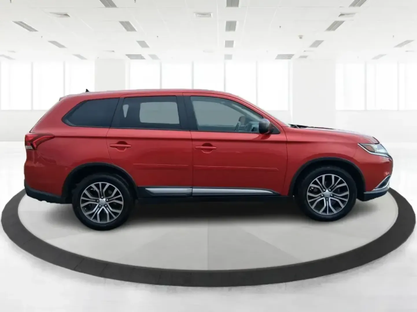2016 Mitsubishi Outlander ES (JA4AZ3A34GZ) with an 2.4L I-4 variable valve control engine, CVT transmission, located at 401 Woodman Dr, Riverside, OH, 45431, (937) 908-9800, 39.760899, -84.123421 - Weekend getaways to Eastwood MetroPark, carpools across Riverside, and comfortable commutes down I675 feel a lot easier when you've got a versatile SUV that can flex with real life. This 2016 Mitsubishi Outlander ES in eye-catching Rally Red Metallic is built for the buyer who wants space, capabilit- Photo#1