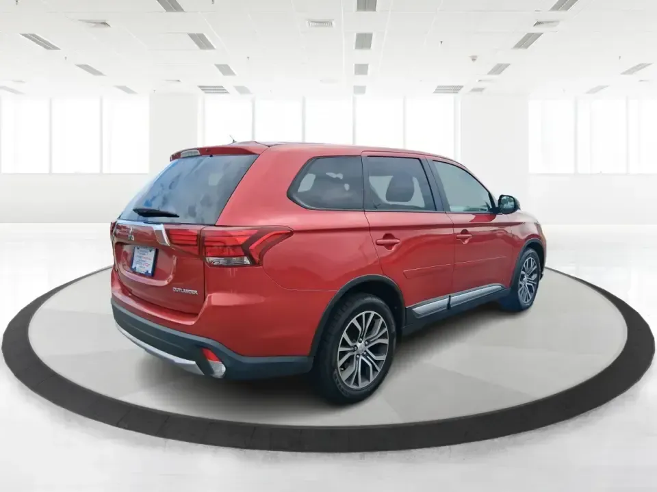 2016 Mitsubishi Outlander ES (JA4AZ3A34GZ) with an 2.4L I-4 variable valve control engine, CVT transmission, located at 401 Woodman Dr, Riverside, OH, 45431, (937) 908-9800, 39.760899, -84.123421 - Weekend getaways to Eastwood MetroPark, carpools across Riverside, and comfortable commutes down I675 feel a lot easier when you've got a versatile SUV that can flex with real life. This 2016 Mitsubishi Outlander ES in eye-catching Rally Red Metallic is built for the buyer who wants space, capabilit - Photo#2