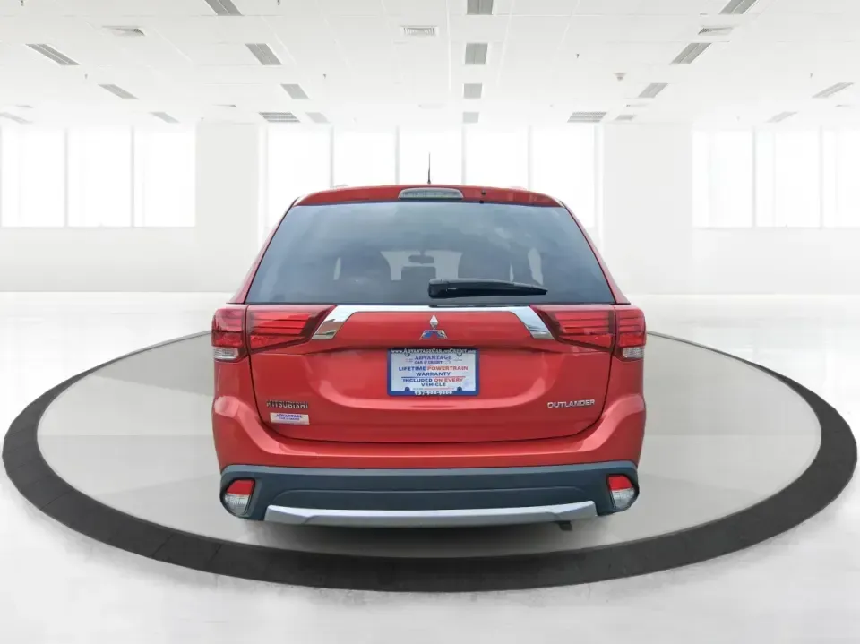 2016 Mitsubishi Outlander ES (JA4AZ3A34GZ) with an 2.4L I-4 variable valve control engine, CVT transmission, located at 401 Woodman Dr, Riverside, OH, 45431, (937) 908-9800, 39.760899, -84.123421 - Weekend getaways to Eastwood MetroPark, carpools across Riverside, and comfortable commutes down I675 feel a lot easier when you've got a versatile SUV that can flex with real life. This 2016 Mitsubishi Outlander ES in eye-catching Rally Red Metallic is built for the buyer who wants space, capabilit - Photo#3