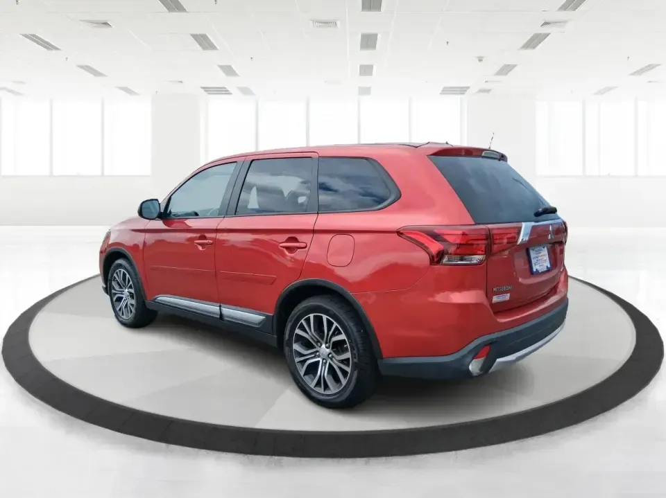 2016 Mitsubishi Outlander ES (JA4AZ3A34GZ) with an 2.4L I-4 variable valve control engine, CVT transmission, located at 401 Woodman Dr, Riverside, OH, 45431, (937) 908-9800, 39.760899, -84.123421 - Weekend getaways to Eastwood MetroPark, carpools across Riverside, and comfortable commutes down I675 feel a lot easier when you've got a versatile SUV that can flex with real life. This 2016 Mitsubishi Outlander ES in eye-catching Rally Red Metallic is built for the buyer who wants space, capabilit - Photo#4