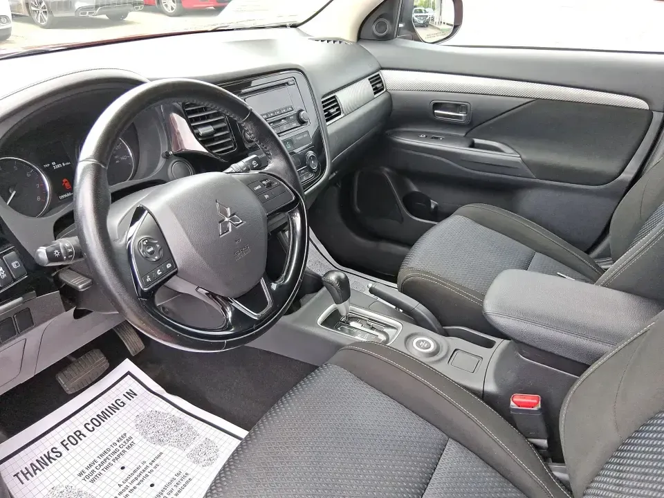 2016 Mitsubishi Outlander ES (JA4AZ3A34GZ) with an 2.4L I-4 variable valve control engine, CVT transmission, located at 401 Woodman Dr, Riverside, OH, 45431, (937) 908-9800, 39.760899, -84.123421 - Weekend getaways to Eastwood MetroPark, carpools across Riverside, and comfortable commutes down I675 feel a lot easier when you've got a versatile SUV that can flex with real life. This 2016 Mitsubishi Outlander ES in eye-catching Rally Red Metallic is built for the buyer who wants space, capabilit - Photo#9