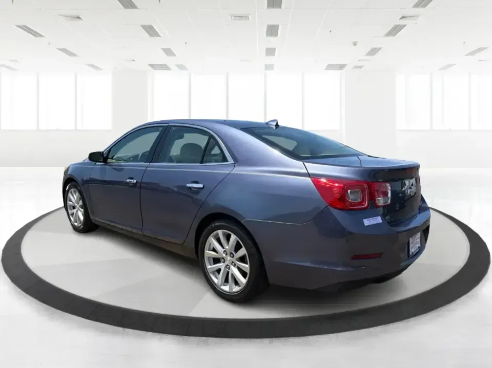 2014 Chevrolet Malibu 1LZ (1G11H5SL5EF) with an ECOTEC 2.5L I-4 gasoline direct injection engine, 6-Speed Automatic transmission, located at 401 Woodman Dr, Riverside, OH, 45431, (937) 908-9800, 39.760899, -84.123421 - Need a dependable sedan for the daily commute to Wright-Patterson AFB, quick errands down Woodman Dr, or comfortable weekend drives along I-675? This 2014 Chevrolet Malibu 1LZ in eye-catching Atlantis Blue Metallic fits real-life routines-school drop-offs, long commutes, and budget-friendly road tri - Photo#4
