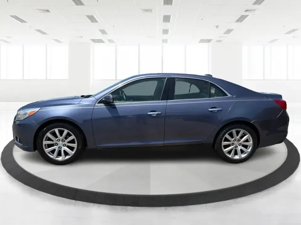 2014 Chevrolet Malibu 1LZ (1G11H5SL5EF) with an ECOTEC 2.5L I-4 gasoline direct injection engine, 6-Speed Automatic transmission, located at 401 Woodman Dr, Riverside, OH, 45431, (937) 908-9800, 39.760899, -84.123421 - Need a dependable sedan for the daily commute to Wright-Patterson AFB, quick errands down Woodman Dr, or comfortable weekend drives along I-675? This 2014 Chevrolet Malibu 1LZ in eye-catching Atlantis Blue Metallic fits real-life routines-school drop-offs, long commutes, and budget-friendly road tri - Photo#5