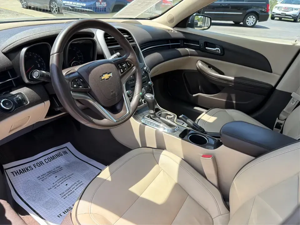 2014 Chevrolet Malibu 1LZ (1G11H5SL5EF) with an ECOTEC 2.5L I-4 gasoline direct injection engine, 6-Speed Automatic transmission, located at 401 Woodman Dr, Riverside, OH, 45431, (937) 908-9800, 39.760899, -84.123421 - Need a dependable sedan for the daily commute to Wright-Patterson AFB, quick errands down Woodman Dr, or comfortable weekend drives along I-675? This 2014 Chevrolet Malibu 1LZ in eye-catching Atlantis Blue Metallic fits real-life routines-school drop-offs, long commutes, and budget-friendly road tri - Photo#9