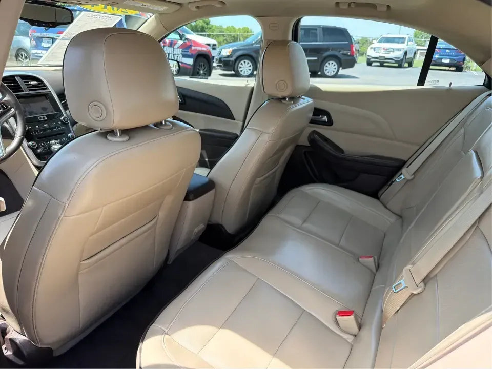 2014 Chevrolet Malibu 1LZ (1G11H5SL5EF) with an ECOTEC 2.5L I-4 gasoline direct injection engine, 6-Speed Automatic transmission, located at 401 Woodman Dr, Riverside, OH, 45431, (937) 908-9800, 39.760899, -84.123421 - Need a dependable sedan for the daily commute to Wright-Patterson AFB, quick errands down Woodman Dr, or comfortable weekend drives along I-675? This 2014 Chevrolet Malibu 1LZ in eye-catching Atlantis Blue Metallic fits real-life routines-school drop-offs, long commutes, and budget-friendly road tri - Photo#10