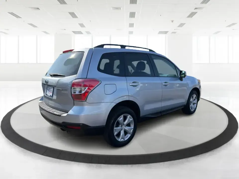 2015 Subaru Forester 2.5i Premium (JF2SJADC8FH) with an 2.5L H-4 DOHC engine, 6-Speed Automatic transmission, located at 880 E. National Road, Vandalia, OH, 45377, (937) 908-9800, 39.891918, -84.183594 - Weekend getaways to Hocking Hills, snowy commutes up I75, or everyday school-drop and grocery runs around Vandalia-this 2015 Subaru Forester 2.5i Premium is built for the kind of Ohio life that doesn't slow down when the weather changes. With Subaru practicality, a roomy hatchback-style cargo area, - Photo#2