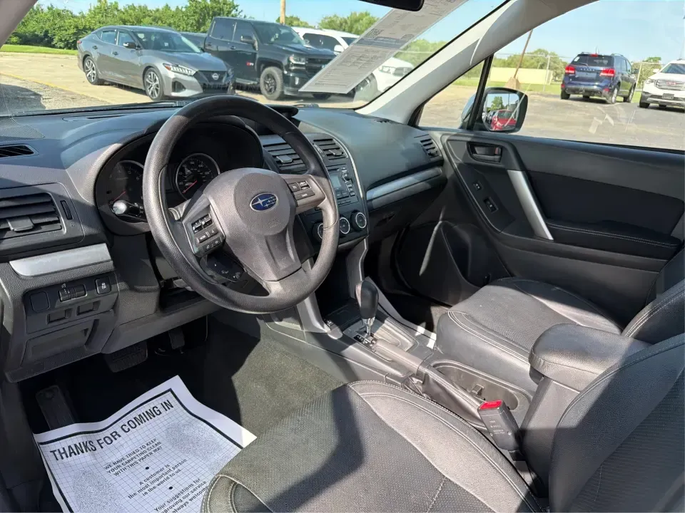 2015 Subaru Forester 2.5i Premium (JF2SJADC8FH) with an 2.5L H-4 DOHC engine, 6-Speed Automatic transmission, located at 880 E. National Road, Vandalia, OH, 45377, (937) 908-9800, 39.891918, -84.183594 - Weekend getaways to Hocking Hills, snowy commutes up I75, or everyday school-drop and grocery runs around Vandalia-this 2015 Subaru Forester 2.5i Premium is built for the kind of Ohio life that doesn't slow down when the weather changes. With Subaru practicality, a roomy hatchback-style cargo area, - Photo#9