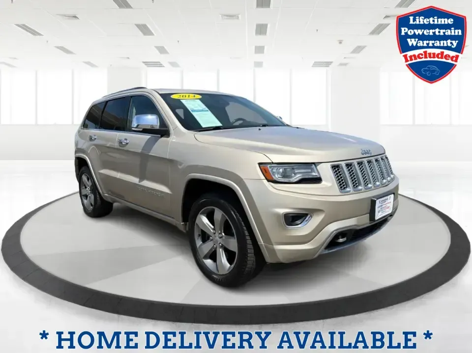 2014 Jeep Grand Cherokee Overland (1C4RJFCTXEC) with an 5.7L V8 OHV 16V engine, 5-Speed Automatic transmission, located at 8750 N County Rd 25A, Piqua, OH, 45356, (937) 908-9800, 40.164391, -84.232513 - Picture your next weekend: loading up for a road trip to Yellow Springs, cruising I675 with the family in comfort, or heading out to the trails and backroads around Wright-Patterson Air Force Base with the confidence of 4WD. This 2014 Jeep Grand Cherokee Overland is built for drivers who want a refi - Photo#0