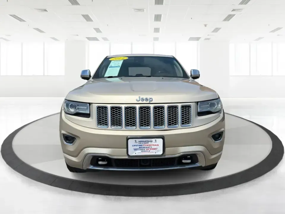 2014 Jeep Grand Cherokee Overland (1C4RJFCTXEC) with an 5.7L V8 OHV 16V engine, 5-Speed Automatic transmission, located at 8750 N County Rd 25A, Piqua, OH, 45356, (937) 908-9800, 40.164391, -84.232513 - Picture your next weekend: loading up for a road trip to Yellow Springs, cruising I675 with the family in comfort, or heading out to the trails and backroads around Wright-Patterson Air Force Base with the confidence of 4WD. This 2014 Jeep Grand Cherokee Overland is built for drivers who want a refi - Photo#7
