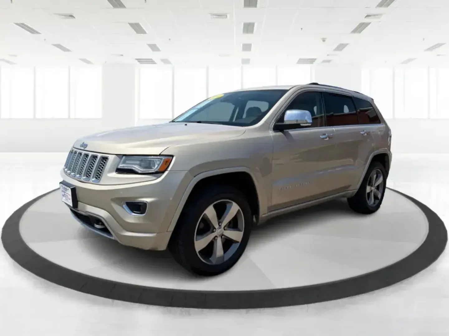 2014 Jeep Grand Cherokee Overland (1C4RJFCTXEC) with an 5.7L V8 OHV 16V engine, 5-Speed Automatic transmission, located at 1951 S Dayton Lakeview Rd., New Carlisle, OH, 45344, (937) 908-9800, 39.890999, -84.050255 - Picture your next weekend: loading up for a road trip to Yellow Springs, cruising I675 with the family in comfort, or heading out to the trails and backroads around Wright-Patterson Air Force Base with the confidence of 4WD. This 2014 Jeep Grand Cherokee Overland is built for drivers who want a refi - Photo#8