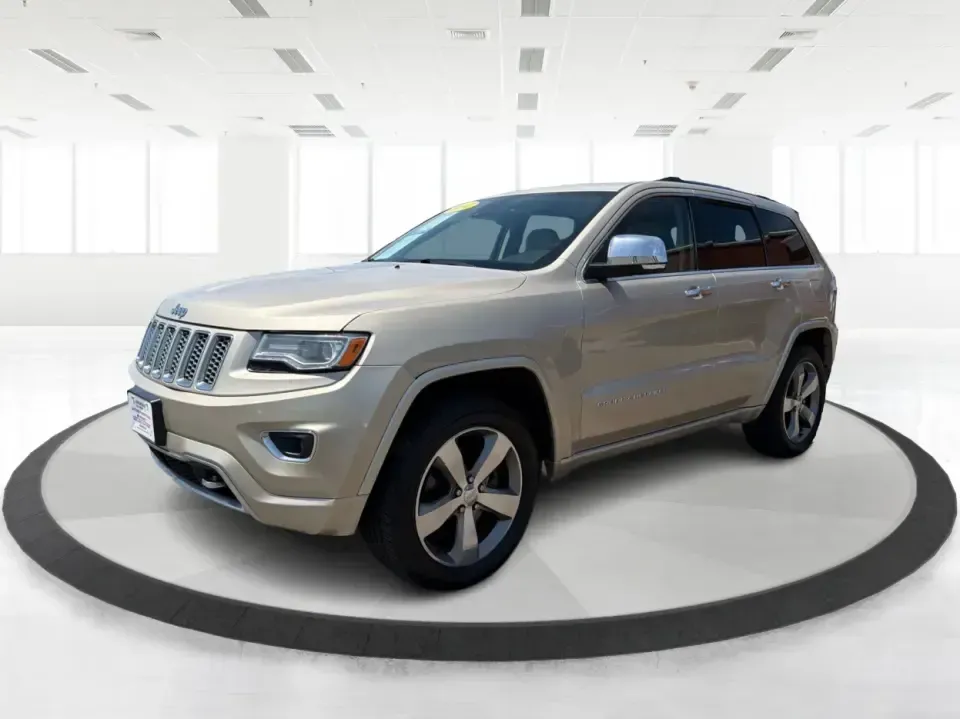 2014 Jeep Grand Cherokee Overland (1C4RJFCTXEC) with an 5.7L V8 OHV 16V engine, 5-Speed Automatic transmission, located at 8750 N County Rd 25A, Piqua, OH, 45356, (937) 908-9800, 40.164391, -84.232513 - Picture your next weekend: loading up for a road trip to Yellow Springs, cruising I675 with the family in comfort, or heading out to the trails and backroads around Wright-Patterson Air Force Base with the confidence of 4WD. This 2014 Jeep Grand Cherokee Overland is built for drivers who want a refi - Photo#8