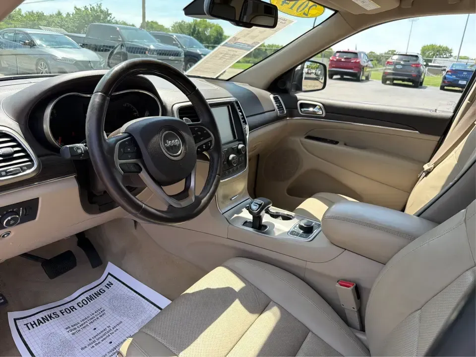2014 Jeep Grand Cherokee Overland (1C4RJFCTXEC) with an 5.7L V8 OHV 16V engine, 5-Speed Automatic transmission, located at 8750 N County Rd 25A, Piqua, OH, 45356, (937) 908-9800, 40.164391, -84.232513 - Picture your next weekend: loading up for a road trip to Yellow Springs, cruising I675 with the family in comfort, or heading out to the trails and backroads around Wright-Patterson Air Force Base with the confidence of 4WD. This 2014 Jeep Grand Cherokee Overland is built for drivers who want a refi - Photo#9