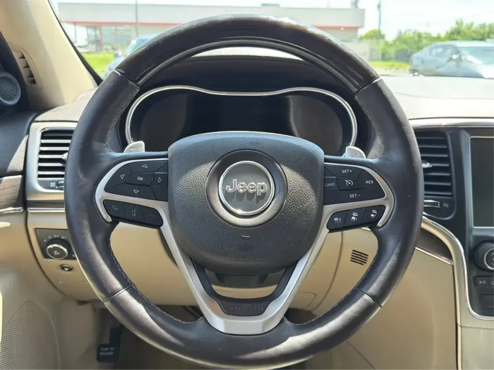 2014 Jeep Grand Cherokee Overland (1C4RJFCTXEC) with an 5.7L V8 OHV 16V engine, 5-Speed Automatic transmission, located at 8750 N County Rd 25A, Piqua, OH, 45356, (937) 908-9800, 40.164391, -84.232513 - Picture your next weekend: loading up for a road trip to Yellow Springs, cruising I675 with the family in comfort, or heading out to the trails and backroads around Wright-Patterson Air Force Base with the confidence of 4WD. This 2014 Jeep Grand Cherokee Overland is built for drivers who want a refi - Photo#16
