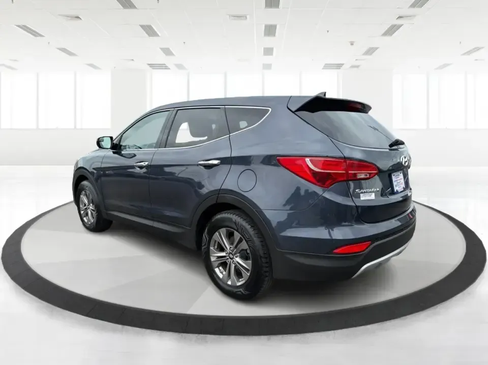 2015 Hyundai Santa Fe 2.4L (5XYZTDLB6FG) with an Theta II 2.4L I-4 gasoline direct injection engine, 6-Speed Automatic transmission, located at 401 Woodman Dr, Riverside, OH, 45431, (937) 908-9800, 39.760899, -84.123421 - Need one SUV that can handle school drop-offs, weekday commutes, and the occasional weekend escape to Eastwood MetroPark or a day trip down I-75? This 2015 Hyundai Santa Fe 2.4L in Mineral Gray fits that real-life rhythm with confident SUV versatility, family-friendly space, and comfort features tha - Photo#4