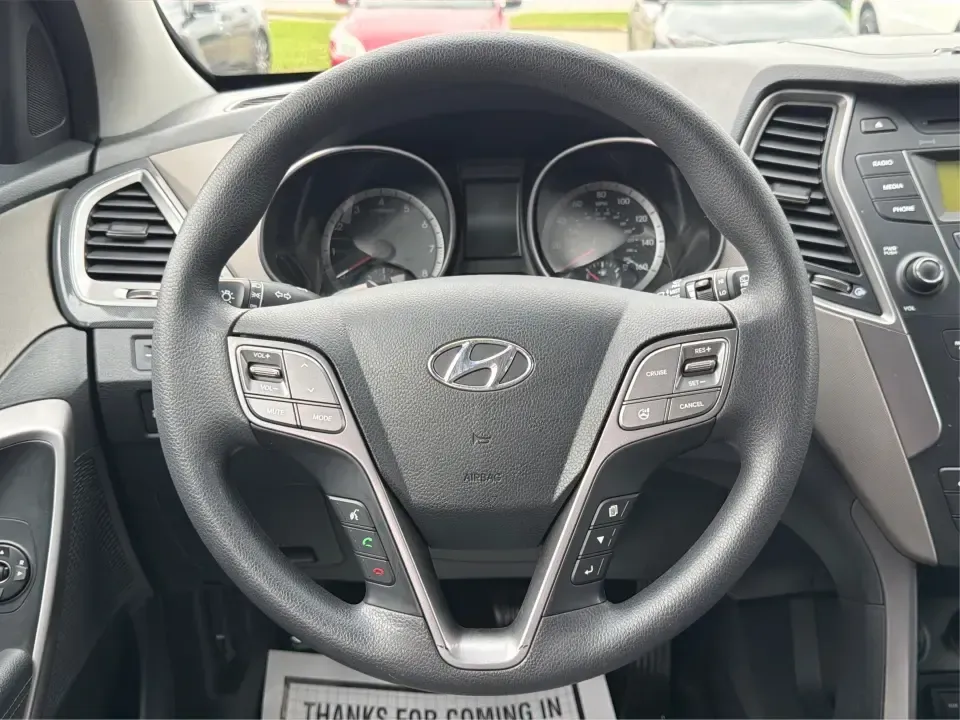 2015 Hyundai Santa Fe 2.4L (5XYZTDLB6FG) with an Theta II 2.4L I-4 gasoline direct injection engine, 6-Speed Automatic transmission, located at 401 Woodman Dr, Riverside, OH, 45431, (937) 908-9800, 39.760899, -84.123421 - Need one SUV that can handle school drop-offs, weekday commutes, and the occasional weekend escape to Eastwood MetroPark or a day trip down I-75? This 2015 Hyundai Santa Fe 2.4L in Mineral Gray fits that real-life rhythm with confident SUV versatility, family-friendly space, and comfort features tha - Photo#16