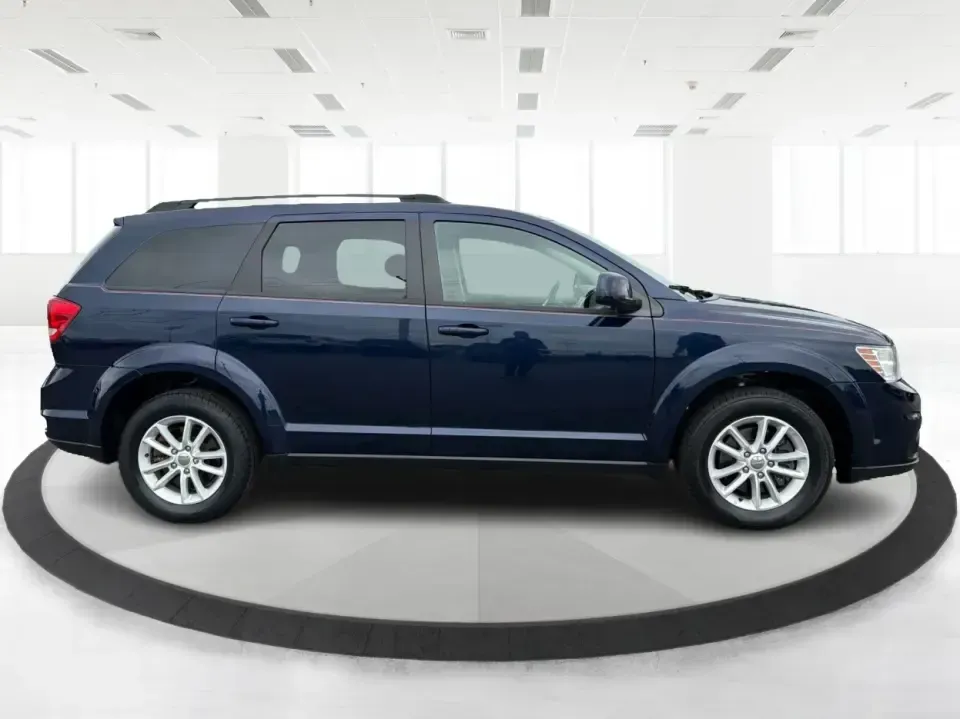 2017 Dodge Journey SXT AWD (3C4PDDBG4HT) with an Pentastar 3.6L V-6 DOHC engine, 6A transmission, located at 1099 N County Rd 25A , Troy, OH, 45373, (937) 908-9800, 40.057079, -84.212883 - Pack up the kids, cue up a playlist, and point your next weekend escape toward the open roads around Miami County-this 2017 Dodge Journey SXT AWD is the kind of SUV that fits real life. Whether you're shuttling to practice, commuting to Dayton, or planning a road trip up I75, the Journey's three-row - Photo#1