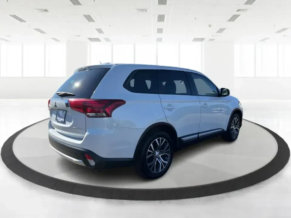 2016 Mitsubishi Outlander ES (JA4AD2A30GZ) with an 2.4L I-4 variable valve control engine, CVT transmission, located at 8750 N County Rd 25A, Piqua, OH, 45356, (937) 908-9800, 40.164391, -84.232513 - Weekend road trips to Indian Lake, daily commutes down I75, or shuttling kids between practice and school-this 2016 Mitsubishi Outlander ES is built for real-life schedules in and around Piqua, Ohio. Finished in Diamond White Pearl, this versatile SUV blends family-friendly space with easy-to-live-w - Photo#2