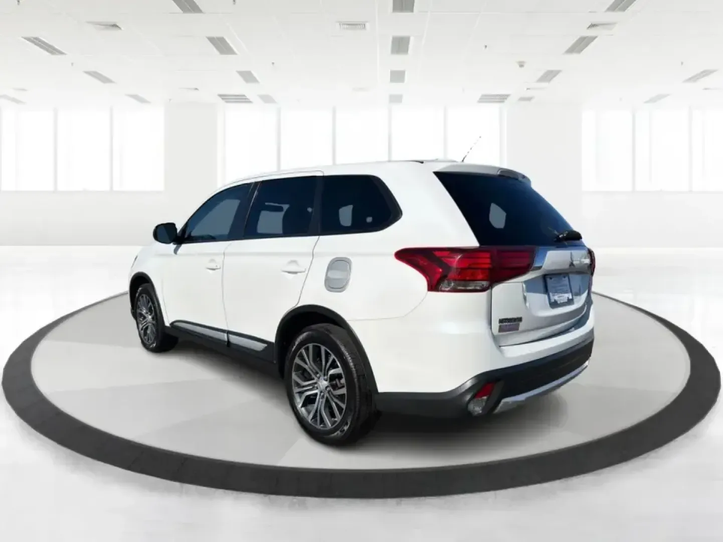 2016 Mitsubishi Outlander ES 2WD (JA4AD2A30GZ) with an 2.4L L4 DOHC 16V engine, CVT transmission, located at 8750 N County Rd 25A, Piqua, OH, 45356, (937) 908-9800, 40.164391, -84.232513 - Picture your next road trip up I75 with the family, a week of school drop-offs in town, and a Saturday run to Lock Nine Riverfront Park-all in one smart, versatile SUV. This 2016 Mitsubishi Outlander ES in Diamond White Pearl is built for real-life Ohio driving, giving you the space and comfort comm- Photo#4
