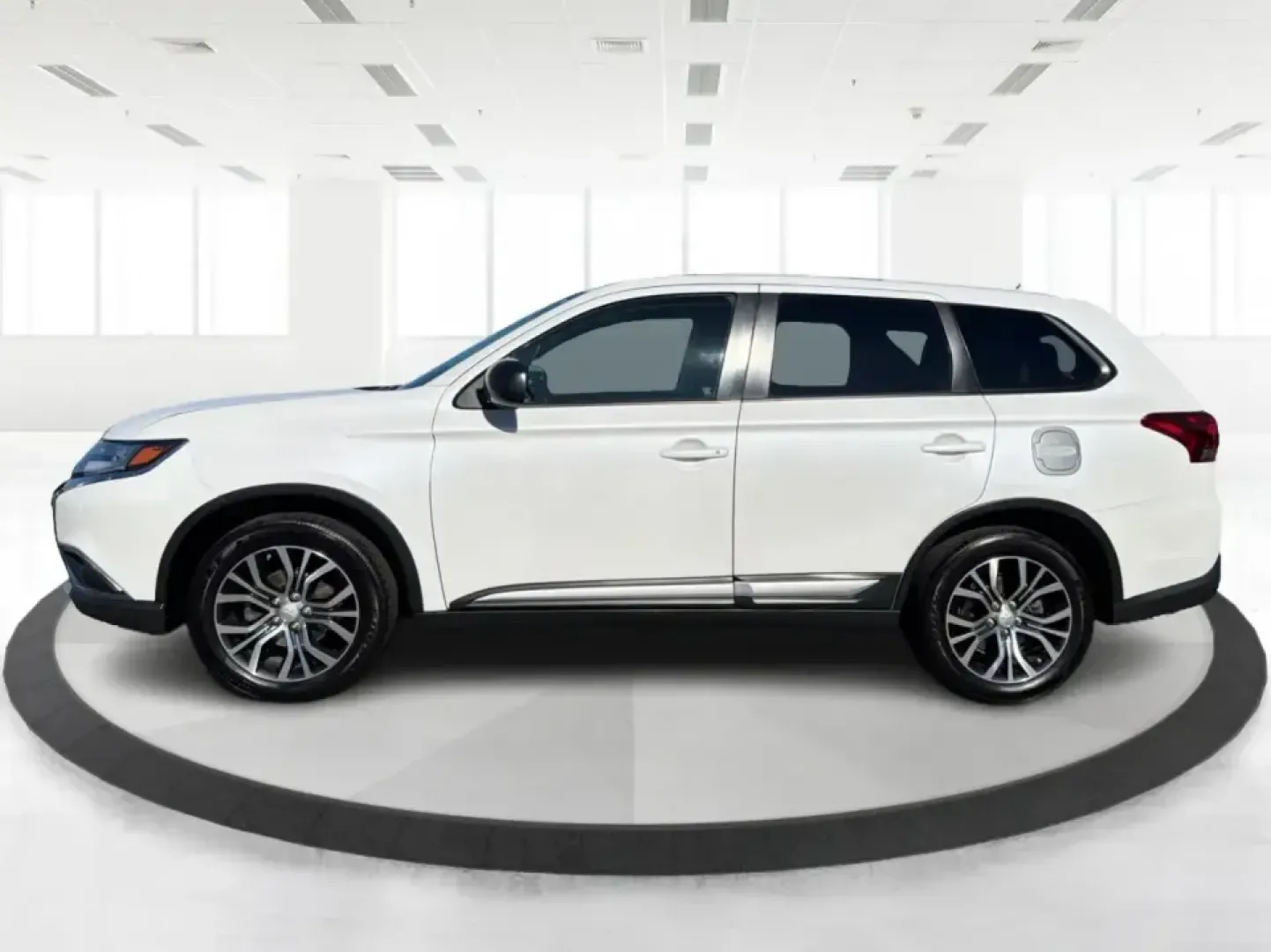 2016 Mitsubishi Outlander ES 2WD (JA4AD2A30GZ) with an 2.4L L4 DOHC 16V engine, CVT transmission, located at 8750 N County Rd 25A, Piqua, OH, 45356, (937) 908-9800, 40.164391, -84.232513 - Picture your next road trip up I75 with the family, a week of school drop-offs in town, and a Saturday run to Lock Nine Riverfront Park-all in one smart, versatile SUV. This 2016 Mitsubishi Outlander ES in Diamond White Pearl is built for real-life Ohio driving, giving you the space and comfort comm- Photo#5
