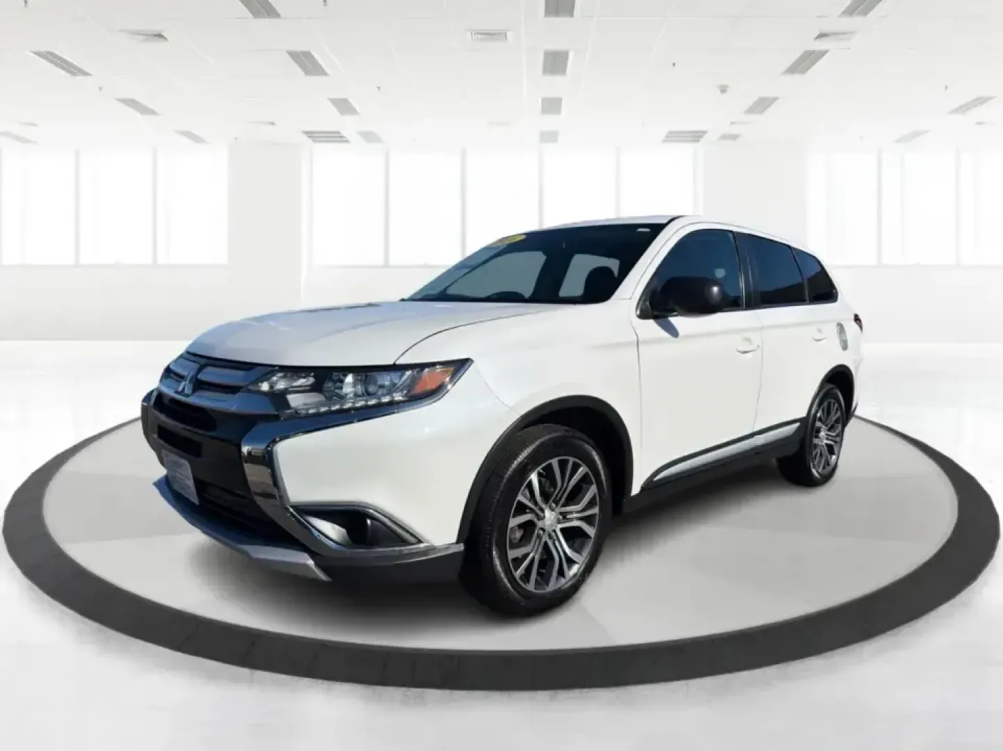2016 Mitsubishi Outlander ES 2WD (JA4AD2A30GZ) with an 2.4L L4 DOHC 16V engine, CVT transmission, located at 8750 N County Rd 25A, Piqua, OH, 45356, (937) 908-9800, 40.164391, -84.232513 - Picture your next road trip up I75 with the family, a week of school drop-offs in town, and a Saturday run to Lock Nine Riverfront Park-all in one smart, versatile SUV. This 2016 Mitsubishi Outlander ES in Diamond White Pearl is built for real-life Ohio driving, giving you the space and comfort comm- Photo#8