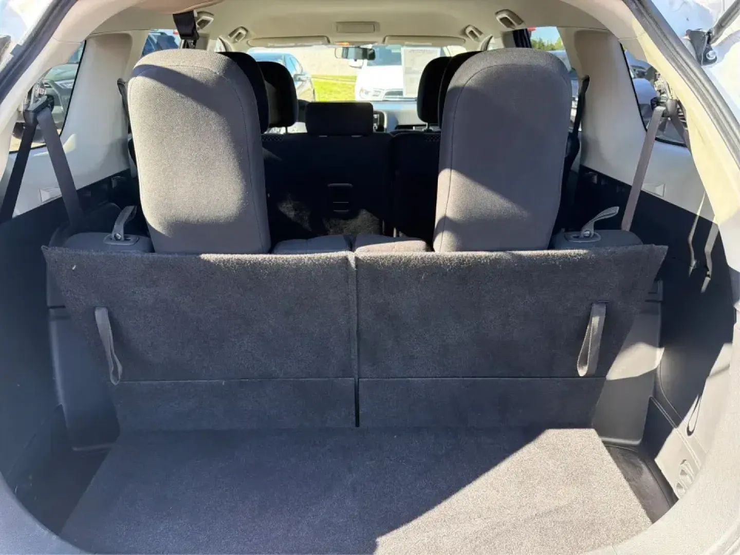 2016 Mitsubishi Outlander ES 2WD (JA4AD2A30GZ) with an 2.4L L4 DOHC 16V engine, CVT transmission, located at 8750 N County Rd 25A, Piqua, OH, 45356, (937) 908-9800, 40.164391, -84.232513 - Picture your next road trip up I75 with the family, a week of school drop-offs in town, and a Saturday run to Lock Nine Riverfront Park-all in one smart, versatile SUV. This 2016 Mitsubishi Outlander ES in Diamond White Pearl is built for real-life Ohio driving, giving you the space and comfort comm- Photo#12