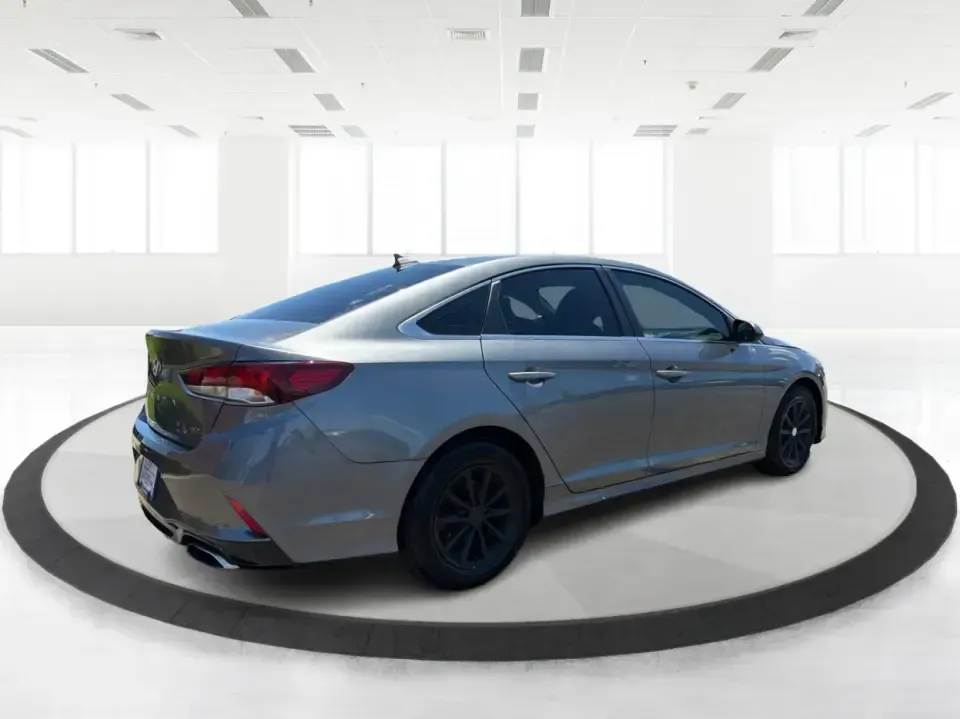 2018 Hyundai Sonata ECO (5NPE24AA3JH) with an 1.6L I-4 gasoline direct injection engine, 7A transmission, located at 1951 S Dayton Lakeview Rd., New Carlisle, OH, 45344, (937) 908-9800, 39.890999, -84.050255 - Need a smart, efficient sedan that can handle a busy weekday commute to Dayton, quick school drop-offs, and the occasional weekend run to Springfield without draining your budget? This 2018 Hyundai Sonata ECO in sleek Machine Gray is an ideal fit for drivers who want comfort, tech, and fuel-friendly - Photo#2