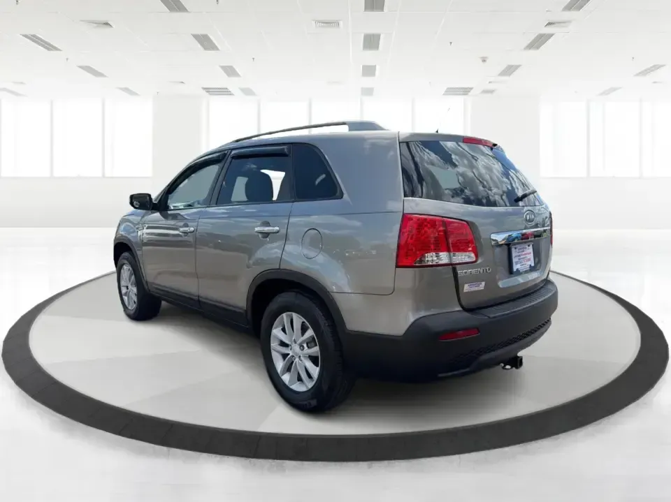 2013 Kia Sorento LX 2WD (5XYKT3A69DG) with an 2.4L L4 DOHC 16V engine, 6-Speed Automatic transmission, located at 8750 N County Rd 25A, Piqua, OH, 45356, (937) 908-9800, 40.164391, -84.232513 - Pack up the kids, load the cooler, and point your weekend plans toward Indian Lake or a quick getaway down I-75-this 2013 Kia Sorento LX 2WD is the kind of practical SUV that fits real life in Piqua. With roomy seating, flexible cargo space, and everyday comfort, it's a smart pick for growing famili - Photo#4