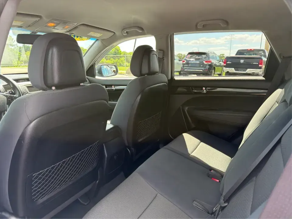 2013 Kia Sorento LX 2WD (5XYKT3A69DG) with an 2.4L L4 DOHC 16V engine, 6-Speed Automatic transmission, located at 8750 N County Rd 25A, Piqua, OH, 45356, (937) 908-9800, 40.164391, -84.232513 - Pack up the kids, load the cooler, and point your weekend plans toward Indian Lake or a quick getaway down I-75-this 2013 Kia Sorento LX 2WD is the kind of practical SUV that fits real life in Piqua. With roomy seating, flexible cargo space, and everyday comfort, it's a smart pick for growing famili - Photo#10