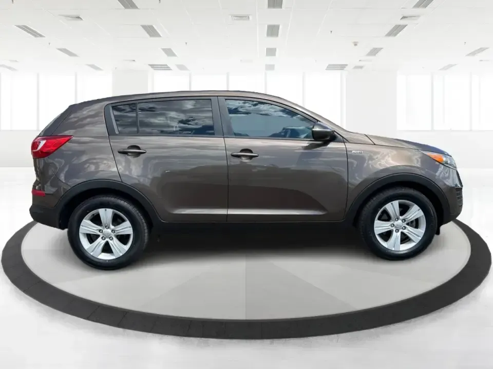 2013 Kia Sportage LX (KNDPBCA27D7) with an 2.4L I-4 DOHC engine, 6-Speed Automatic transmission, located at 1099 N County Rd 25A , Troy, OH, 45373, (937) 908-9800, 40.057079, -84.212883 - Pack up for a weekend at Troy Community Park, tackle a snowy school run, or cruise I75 for your daily commute-this 2013 Kia Sportage LX is the kind of compact SUV that fits real life in West Central Ohio. With its versatile crossover size, confident AWD capability, and practical cargo space, it's a - Photo#1