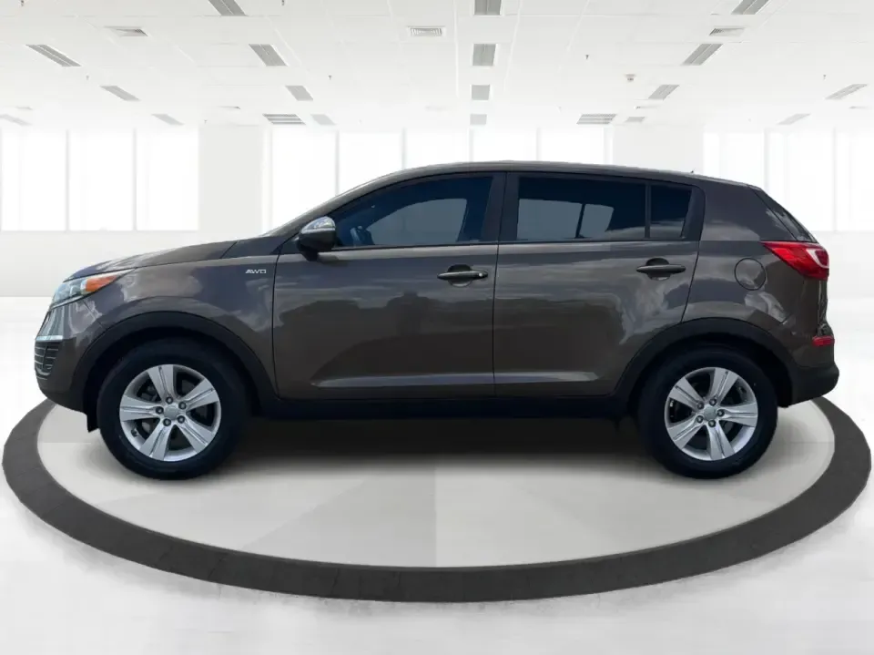 2013 Kia Sportage LX (KNDPBCA27D7) with an 2.4L I-4 DOHC engine, 6-Speed Automatic transmission, located at 1099 N County Rd 25A , Troy, OH, 45373, (937) 908-9800, 40.057079, -84.212883 - Pack up for a weekend at Troy Community Park, tackle a snowy school run, or cruise I75 for your daily commute-this 2013 Kia Sportage LX is the kind of compact SUV that fits real life in West Central Ohio. With its versatile crossover size, confident AWD capability, and practical cargo space, it's a - Photo#5