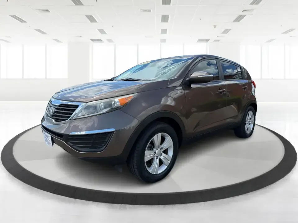 2013 Kia Sportage LX (KNDPBCA27D7) with an 2.4L I-4 DOHC engine, 6-Speed Automatic transmission, located at 1099 N County Rd 25A , Troy, OH, 45373, (937) 908-9800, 40.057079, -84.212883 - Pack up for a weekend at Troy Community Park, tackle a snowy school run, or cruise I75 for your daily commute-this 2013 Kia Sportage LX is the kind of compact SUV that fits real life in West Central Ohio. With its versatile crossover size, confident AWD capability, and practical cargo space, it's a - Photo#8