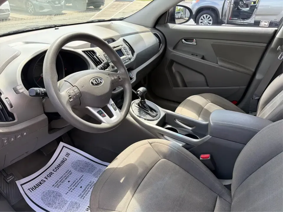 2013 Kia Sportage LX (KNDPBCA27D7) with an 2.4L I-4 DOHC engine, 6-Speed Automatic transmission, located at 1099 N County Rd 25A , Troy, OH, 45373, (937) 908-9800, 40.057079, -84.212883 - Pack up for a weekend at Troy Community Park, tackle a snowy school run, or cruise I75 for your daily commute-this 2013 Kia Sportage LX is the kind of compact SUV that fits real life in West Central Ohio. With its versatile crossover size, confident AWD capability, and practical cargo space, it's a - Photo#9