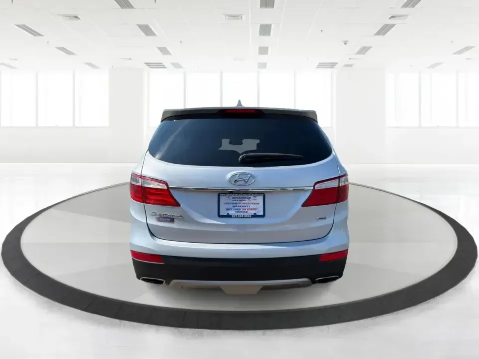 2016 Hyundai Santa Fe SE (KM8SMDHF5GU) with an 3.3L V-6 gasoline direct injection engine, 6A transmission, located at 1184 Kauffman Ave, Fairborn, OH, 45324, (937) 908-9800, 39.807072, -84.030914 - Whether you're hauling the kids to practice in Beavercreek, commuting to Wright-Patterson AFB, or loading up for a weekend escape toward Yellow Springs, this 2016 Hyundai Santa Fe SE is the kind of SUV that fits real life-roomy, confident in changing Ohio weather, and packed with comfort features th - Photo#3