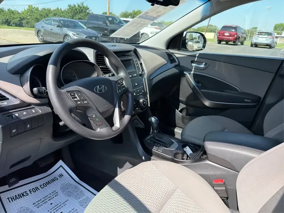 2016 Hyundai Santa Fe SE (KM8SMDHF5GU) with an 3.3L V-6 gasoline direct injection engine, 6A transmission, located at 1184 Kauffman Ave, Fairborn, OH, 45324, (937) 908-9800, 39.807072, -84.030914 - Whether you're hauling the kids to practice in Beavercreek, commuting to Wright-Patterson AFB, or loading up for a weekend escape toward Yellow Springs, this 2016 Hyundai Santa Fe SE is the kind of SUV that fits real life-roomy, confident in changing Ohio weather, and packed with comfort features th - Photo#9
